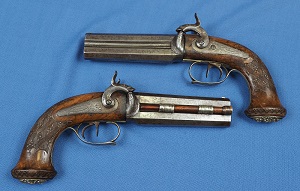 Pair of Milanese Over/Under pistols c1840